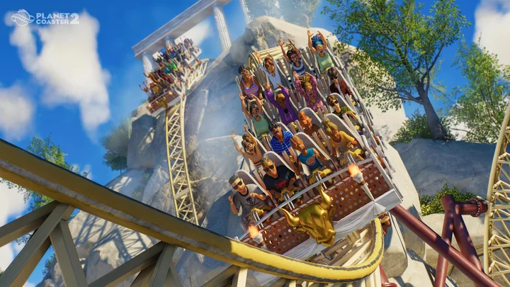 Planet Coaster 2 - Launch screenshot - 06 - Guests Riding Coasters